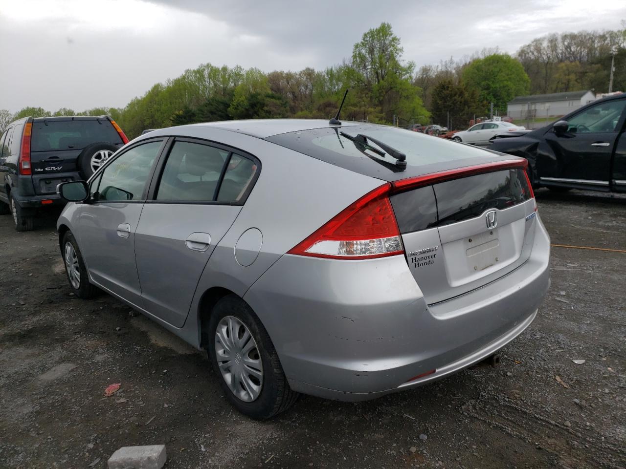 Photo 3 from auction – 2011 HONDA INSIGHT LX with VIN JHMZE2H55BS011697