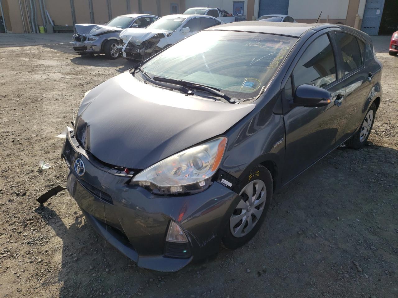 Photo 2 from auction – 2013 TOYOTA PRIUS C with VIN JTDKDTB36D1053274