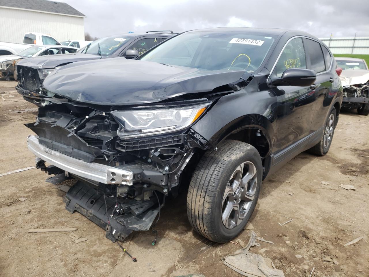 Photo 2 from auction – 2019 HONDA CR-V EX with VIN 2HKRW2H56KH664732