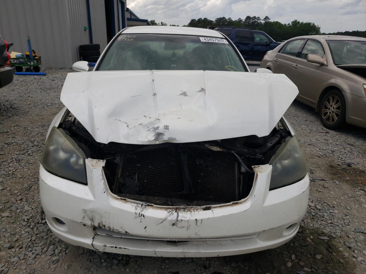 Photo 9 from auction – 2006 NISSAN ALTIMA S with VIN 1N4AL11D56C169818