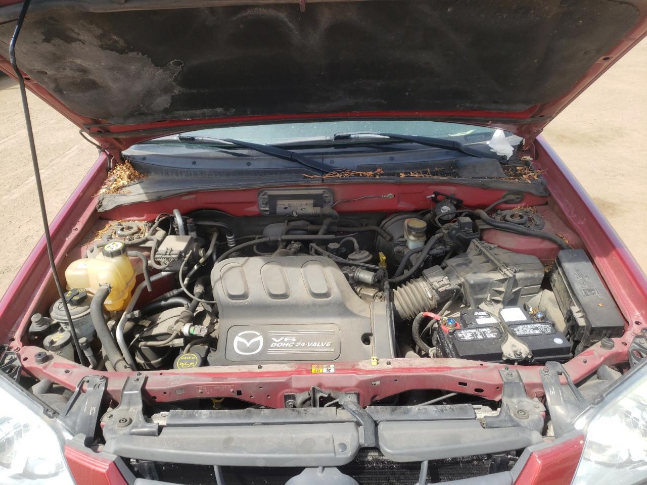 Photo 7 from auction – 2004 MAZDA TRIBUTE LX with VIN 4F2YZ94134KM31815