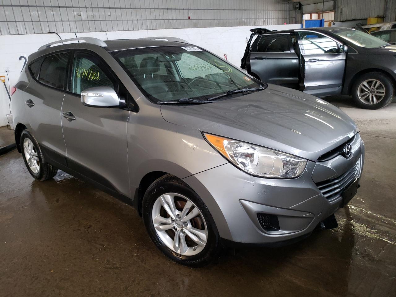 HYUNDAI TUCSON GLS 2012 with VIN KM8JUCAC3CU374677 - Photo from auction