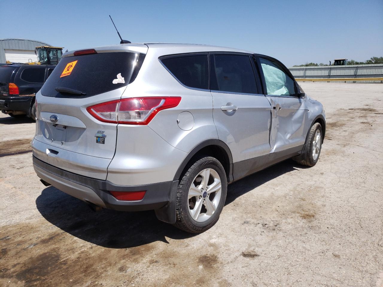 Photo 4 from auction – 2014 FORD ESCAPE SE with VIN 1FMCU9G97EUE39475
