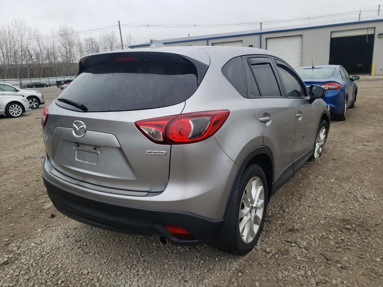Photo 4 from auction – 2014 MAZDA CX-5 GT with VIN JM3KE4DY6E0341354