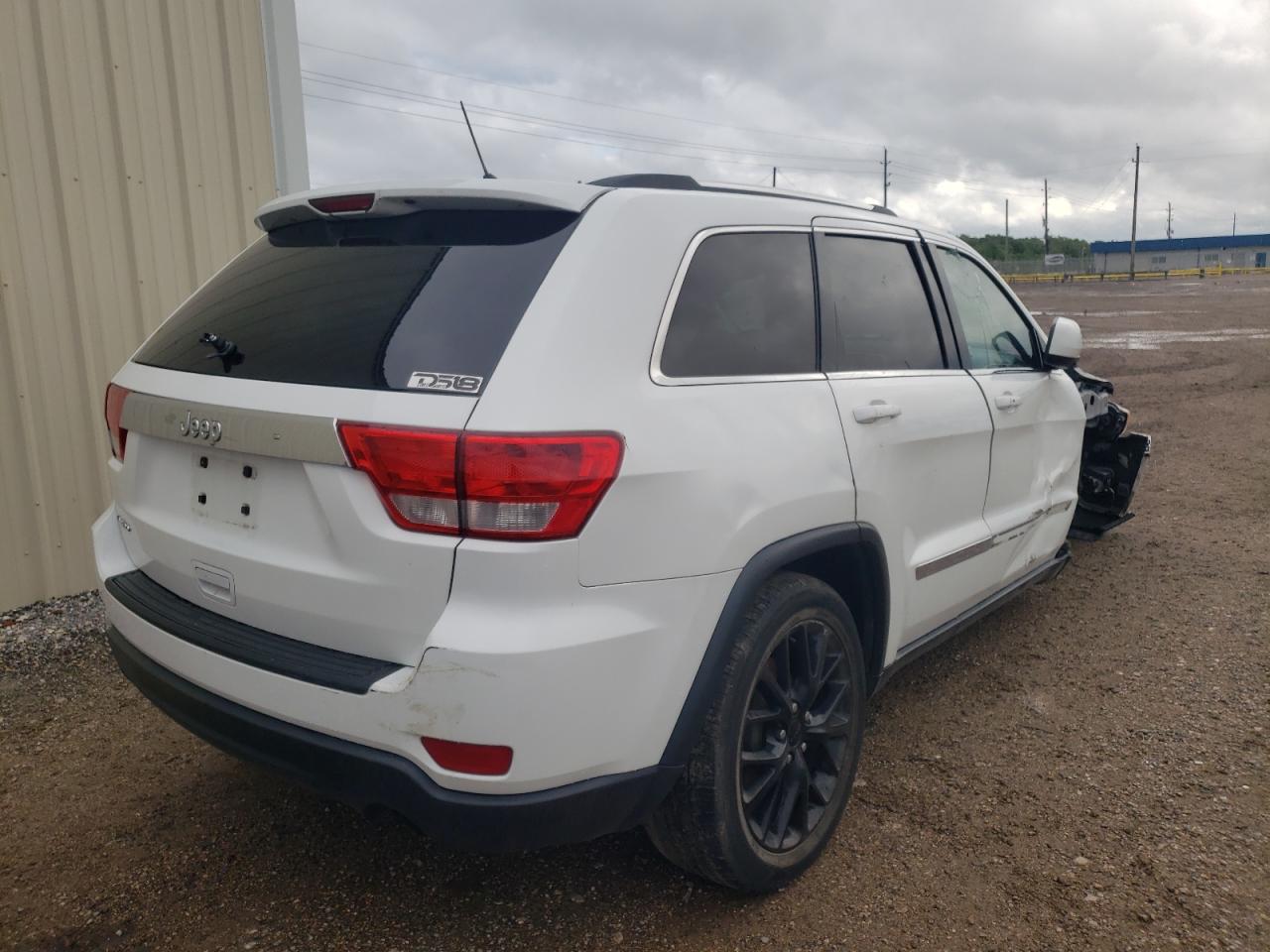 Photo 4 from auction – 2013 JEEP GRAND CHER with VIN 1C4RJEAG3DC514202