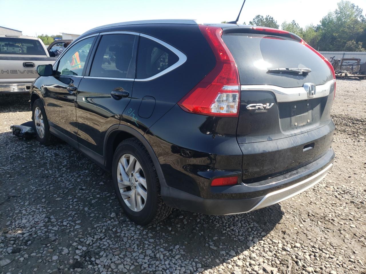 Photo 3 from auction – 2016 HONDA CR-V EXL with VIN 2HKRM3H79GH560255