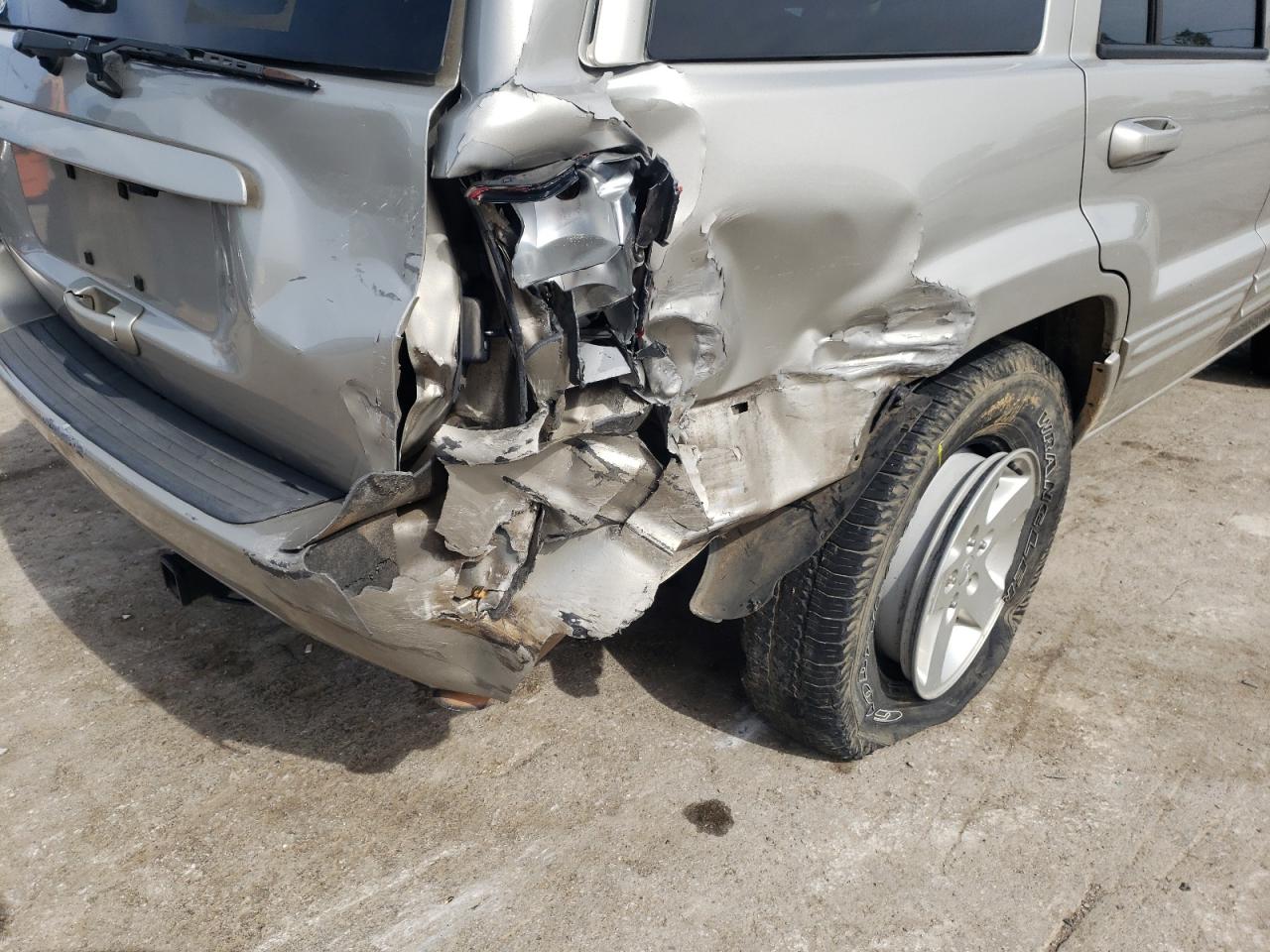Photo 9 from auction – 2004 JEEP GRAND CHER with VIN 1J4GX58S44C184483