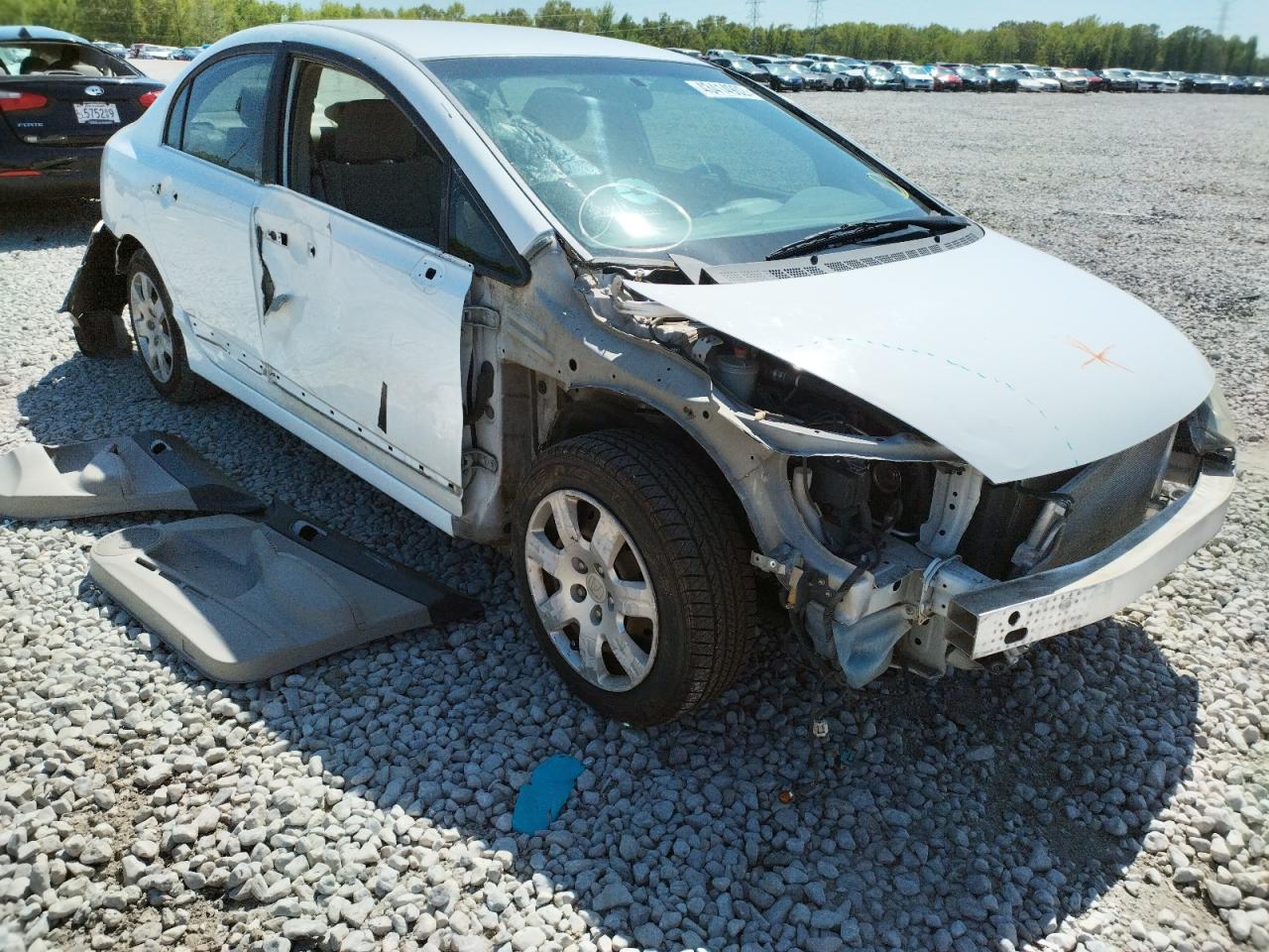Photo 20 from auction – 2011 HONDA CIVIC LX with VIN 19XFA1F57BE032504