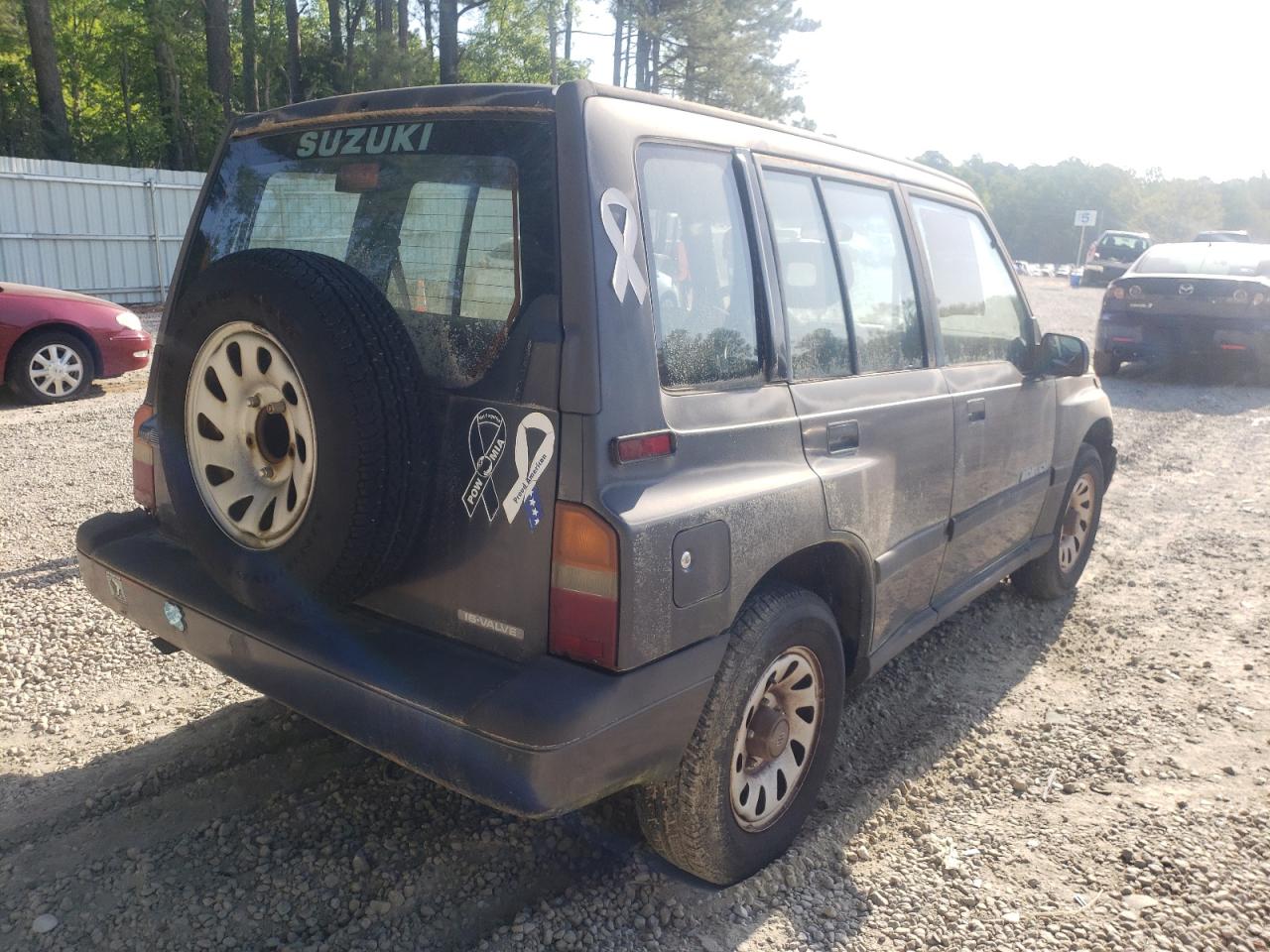 Photo 4 from auction – 1994 SUZUKI SIDEKICK J with VIN 2S3TE02V8R6413197