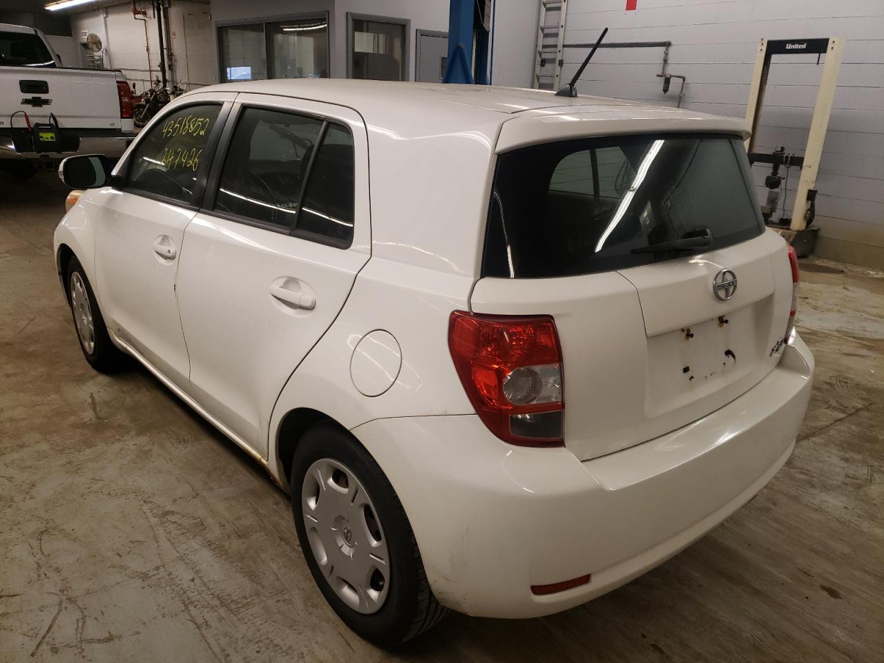 Photo 3 from auction – 2009 TOYOTA SCION XD with VIN JTKKU10449J035582