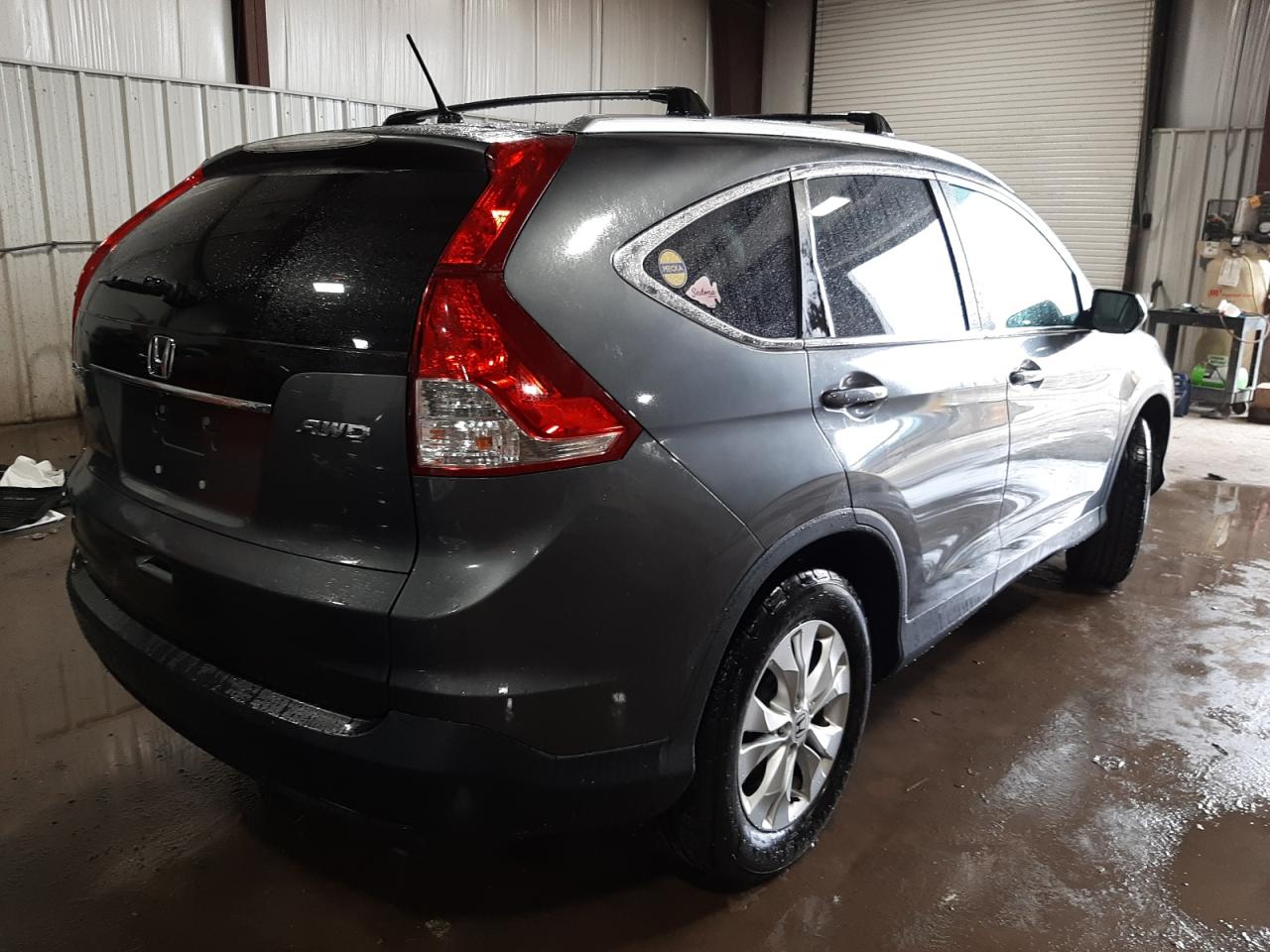 Photo 4 from auction – 2014 HONDA CR-V EX with VIN 5J6RM4H58EL070039