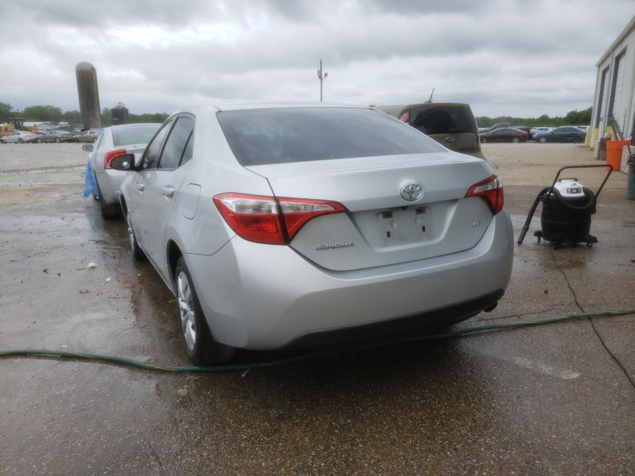 Photo 3 from auction – 2015 TOYOTA COROLLA L with VIN 5YFBURHE6FP352127