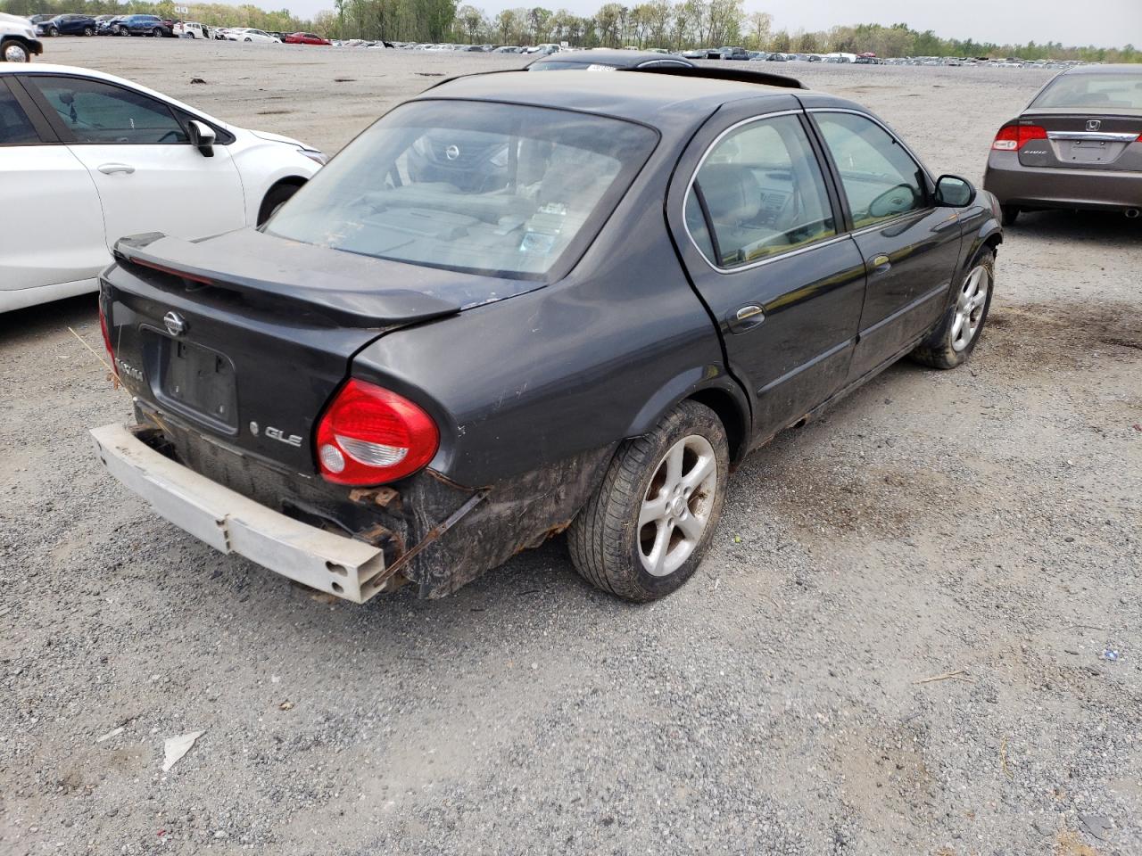 Photo 4 from auction – 2001 NISSAN MAXIMA GXE with VIN JN1CA31A61T105390