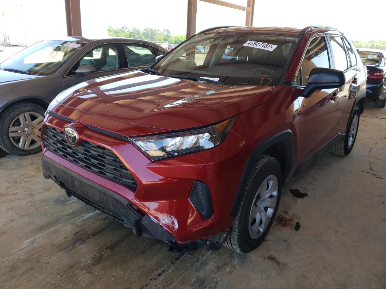 Photo 2 from auction – 2021 TOYOTA RAV4 LE with VIN JTMH1RFV3MD064393