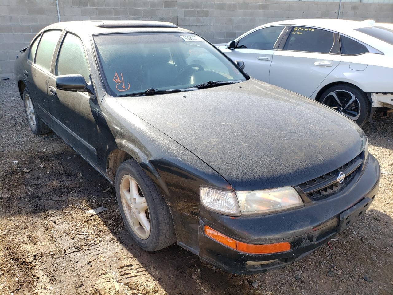 NISSAN MAXIMA GLE 1997 with VIN JN1CA21D4VT204428 - Photo from auction