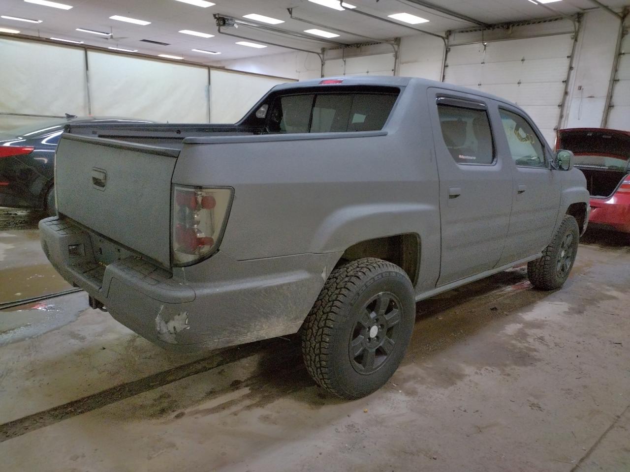 Photo 4 from auction – 2009 HONDA RIDGELINE with VIN 2HJYK16559H003552