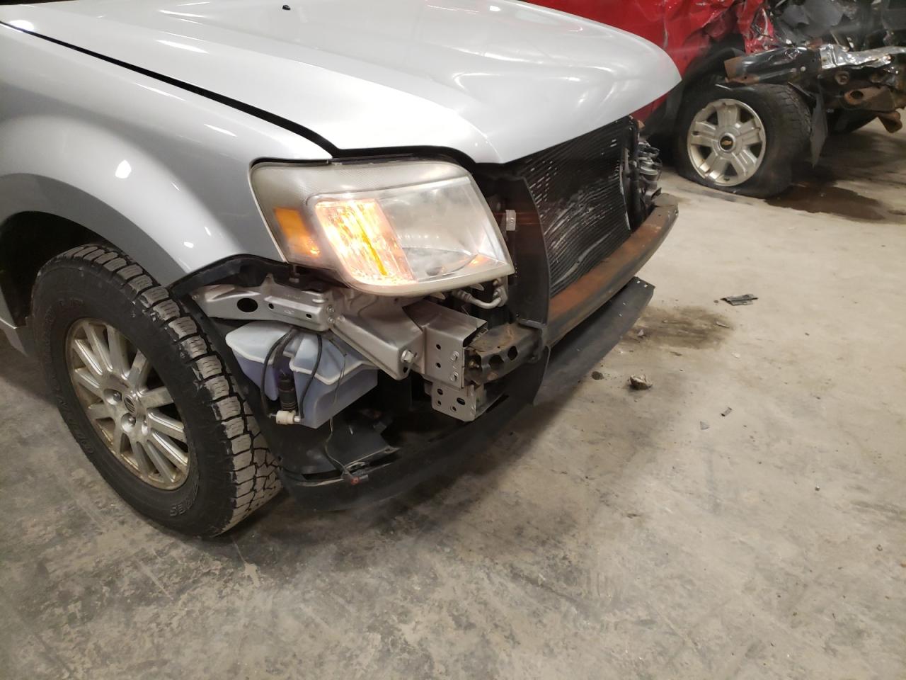 Photo 9 from auction – 2010 MERCURY MARINER PR with VIN 4M2CN9H7XAKJ20487