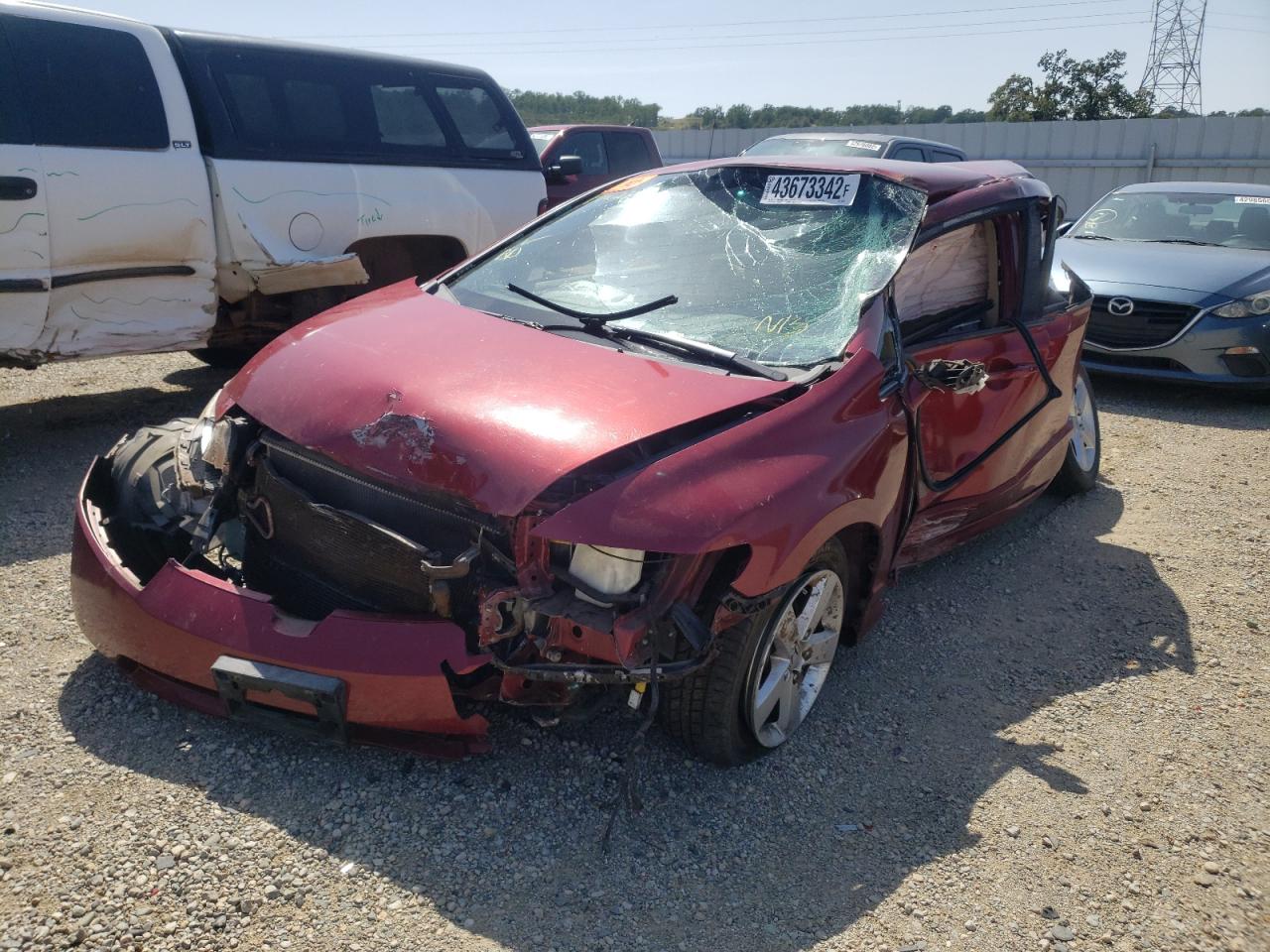 Photo 2 from auction – 2007 HONDA CIVIC LX with VIN JHMFA16507S005597