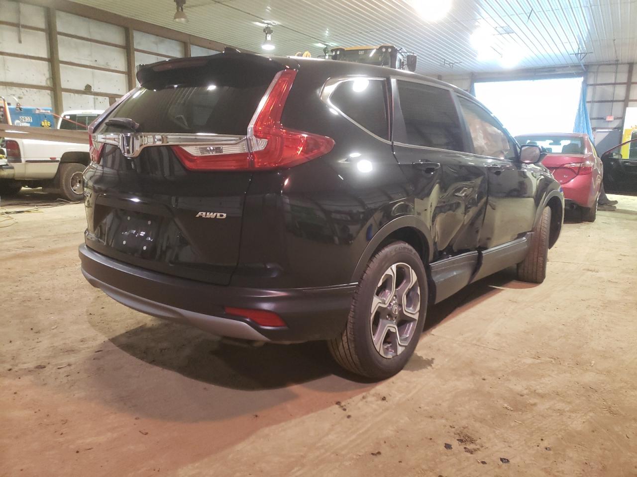 Photo 4 from auction – 2018 HONDA CR-V EX with VIN 7FARW2H59JE087566