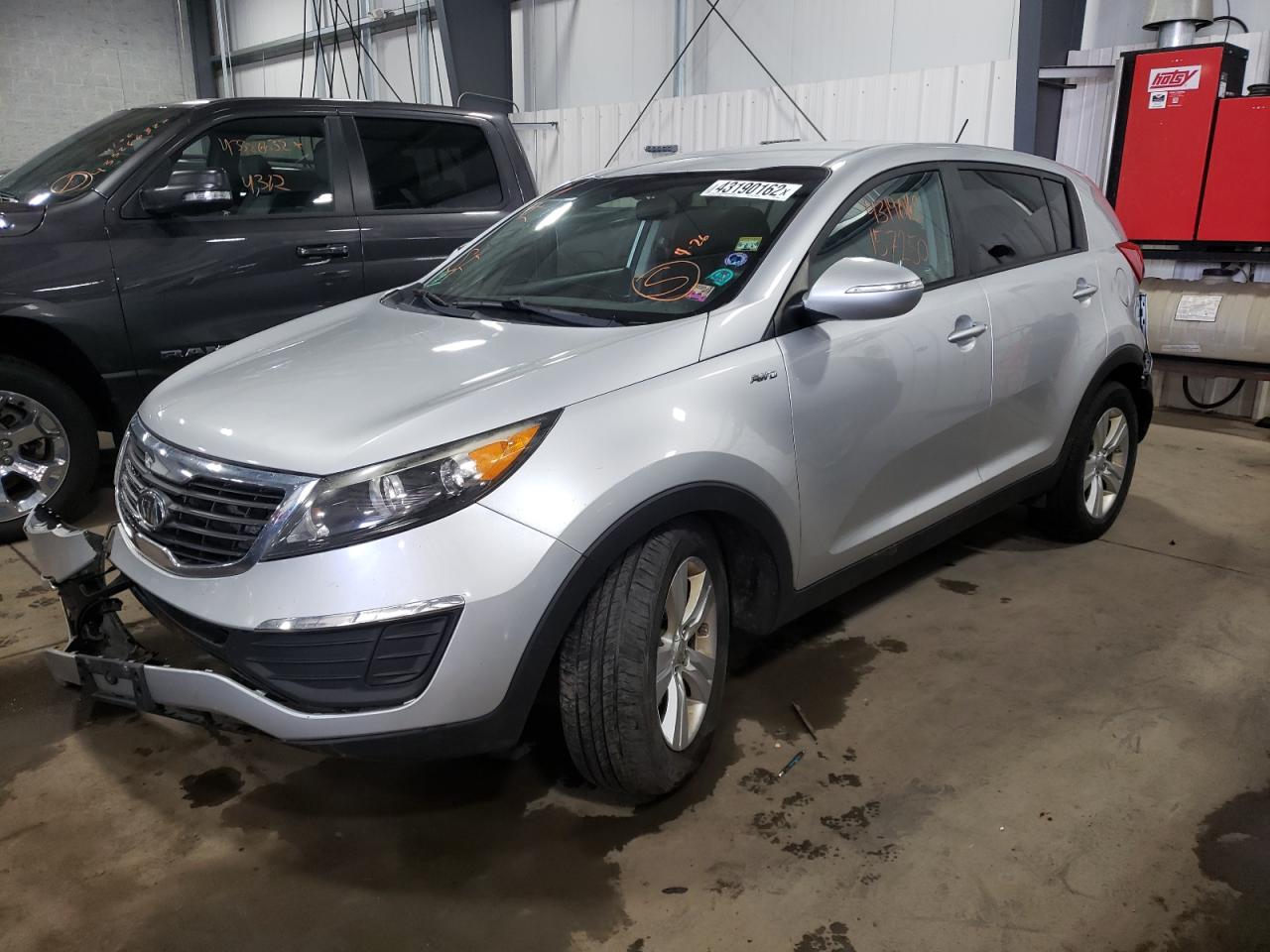 Photo 2 from auction – 2012 KIA SPORTAGE L with VIN KNDPBCA23C7296847