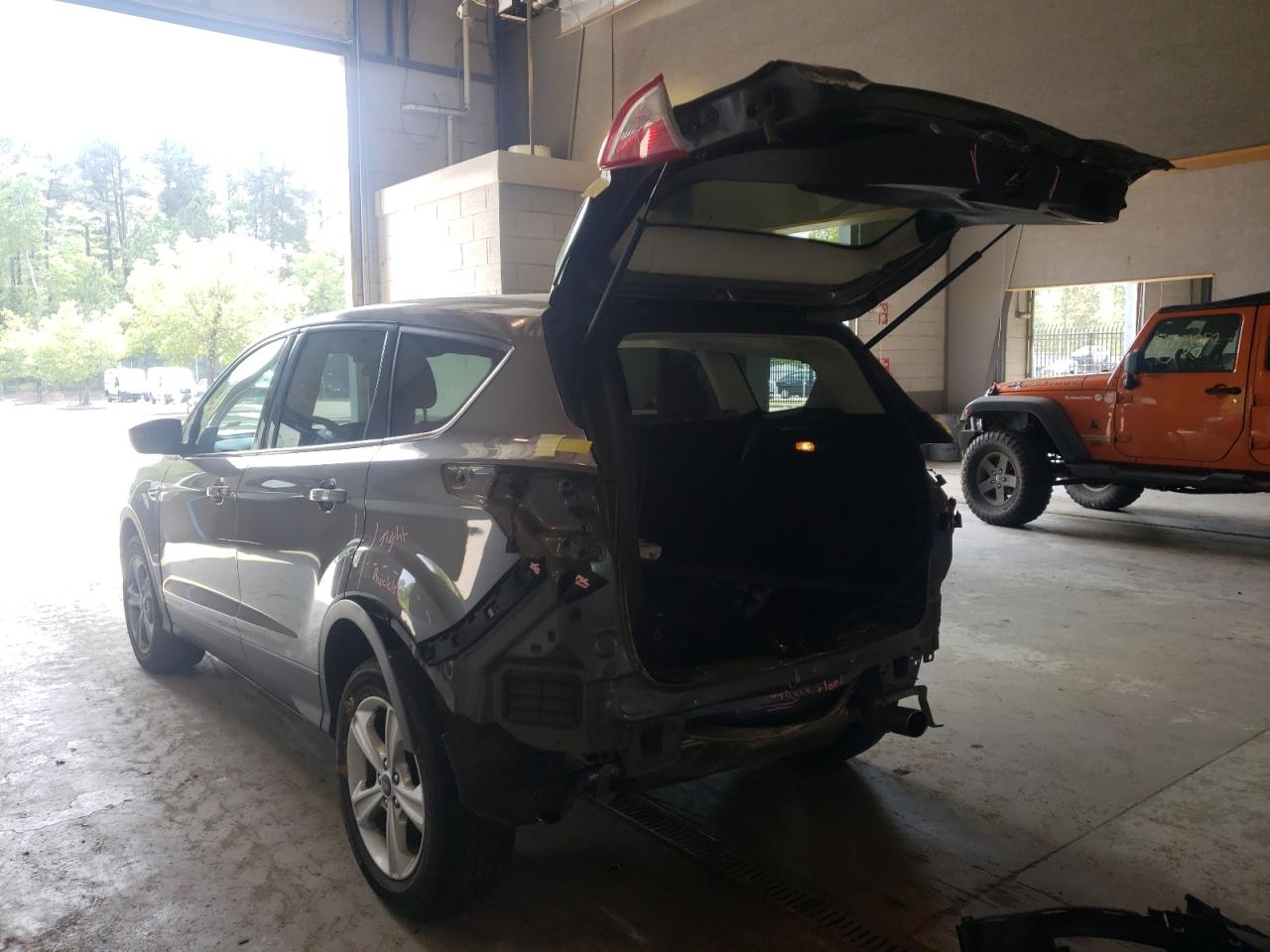 Photo 3 from auction – 2014 FORD ESCAPE SE with VIN 1FMCU0GX5EUA73252