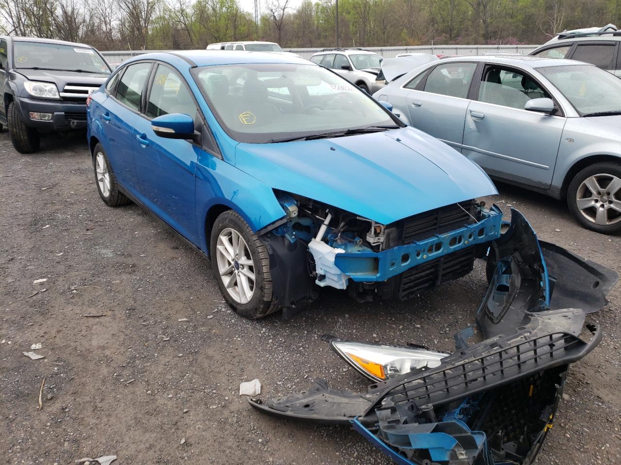 FORD FOCUS SE 2015 with VIN 1FADP3F24FL285631 - Photo from auction
