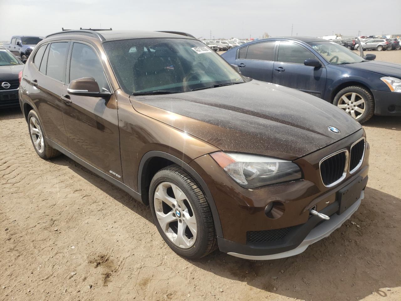 BMW X1 SDRIVE2 2015 with VIN WBAVM1C58FVW56902 - Photo from auction