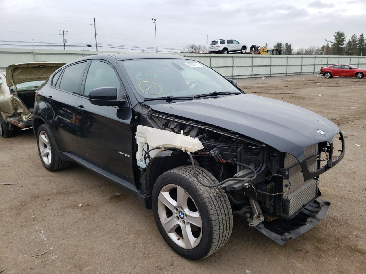 BMW X6 XDRIVE3 2011 with VIN 5UXFG2C58BLX08067 - Photo from auction