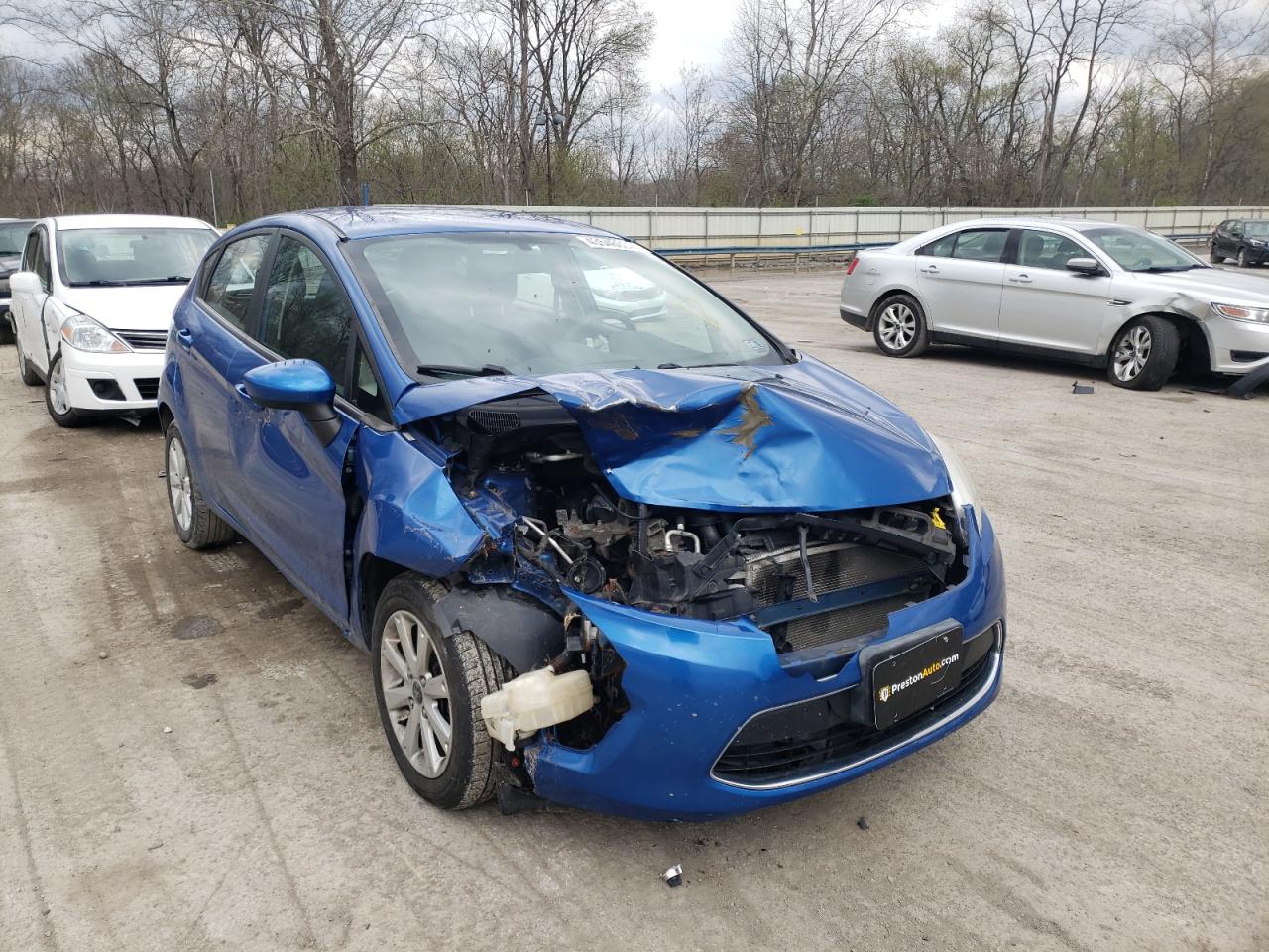 FORD FIESTA SE 2011 with VIN 3FADP4EJ7BM142339 - Photo from auction