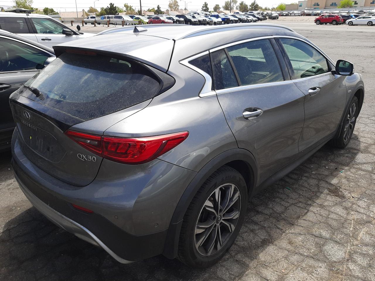 Photo 4 from auction – 2018 INFINITI QX30 BASE with VIN SJKCH5CR8JA047668