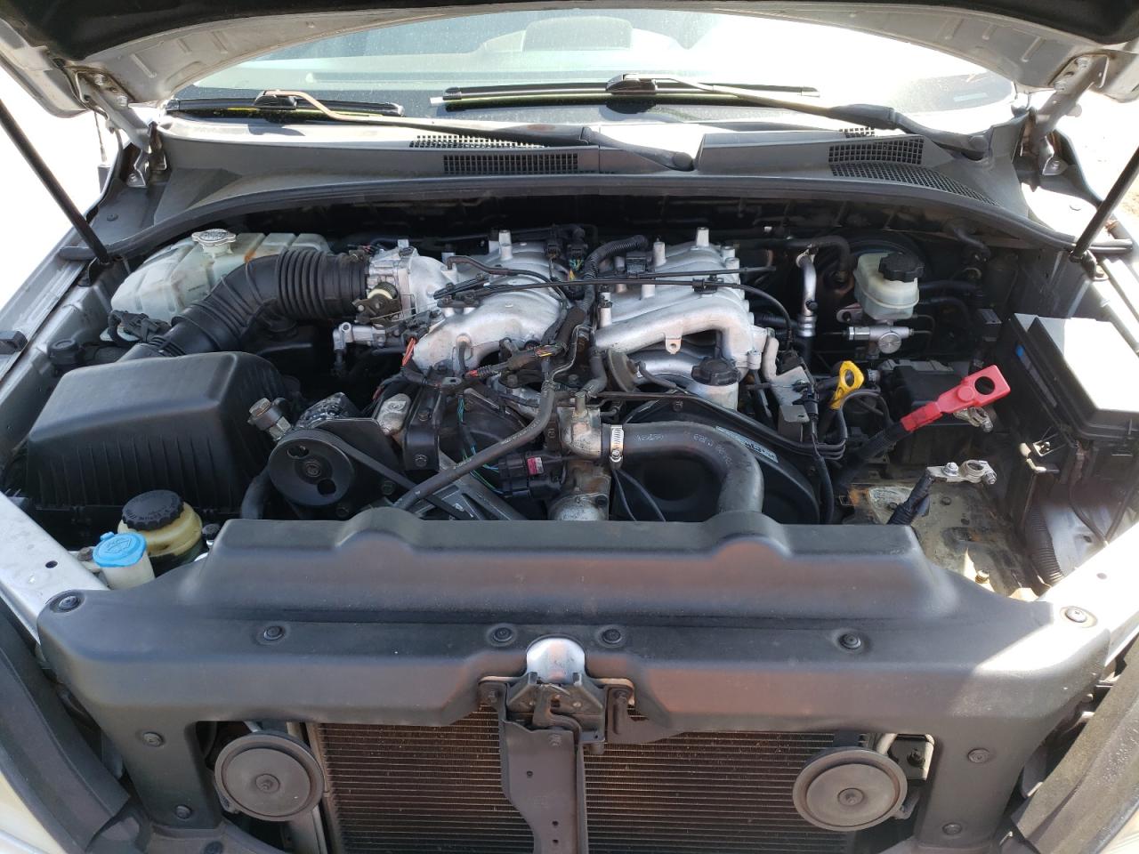 Photo 12 from auction – 2005 KIA SORENTO EX with VIN KNDJD733X55400584