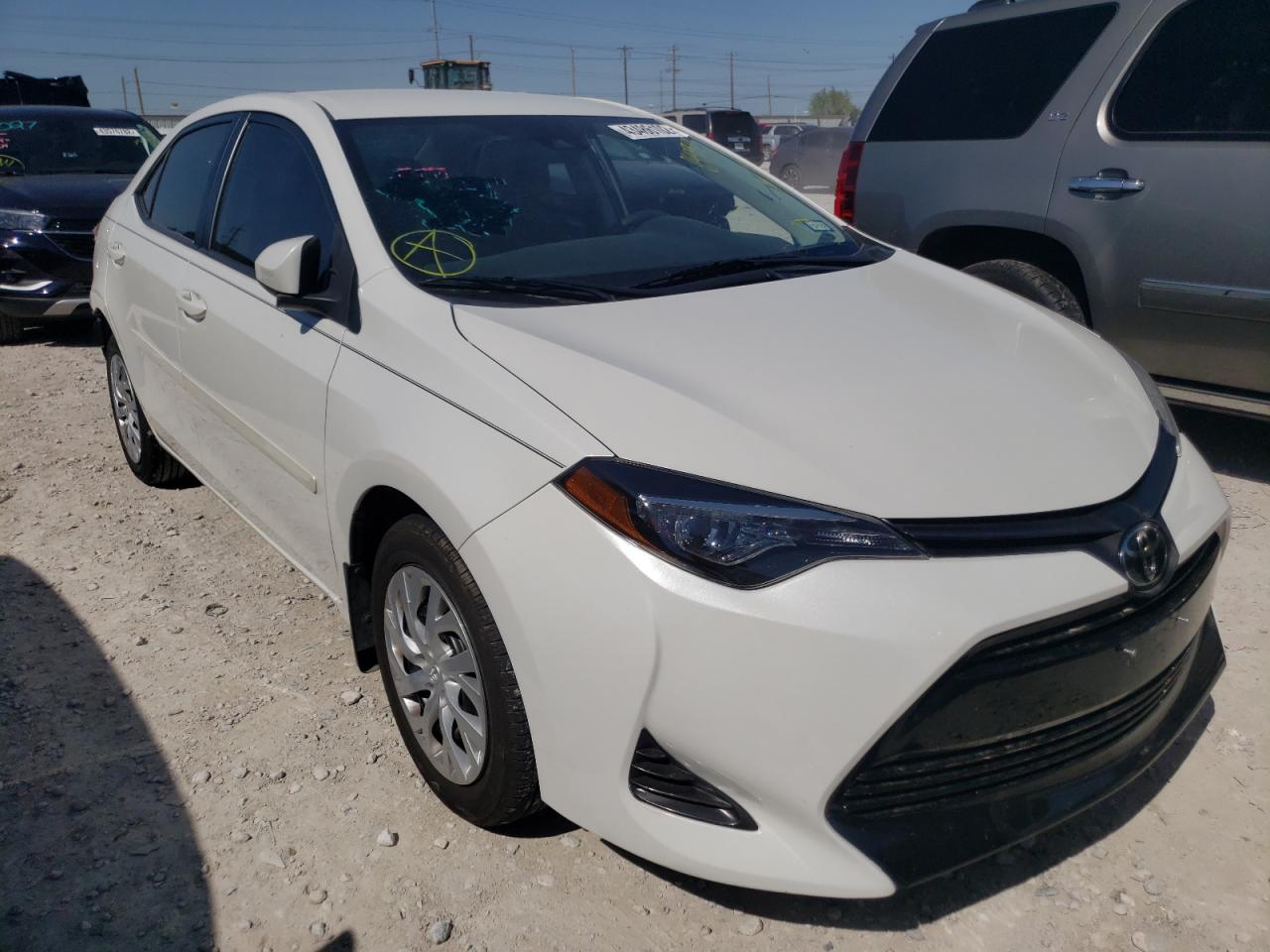 TOYOTA COROLLA L 2019 with VIN 5YFBURHE3KP894974 - Photo from auction