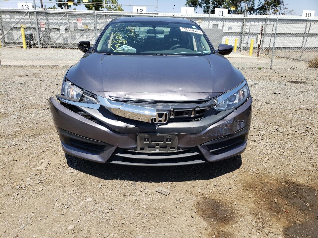 Photo 9 from auction – 2018 HONDA CIVIC LX with VIN 2HGFC2F57JH526222