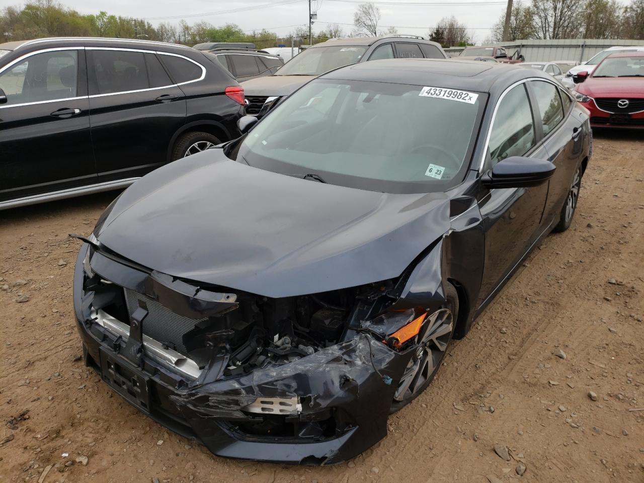Photo 2 from auction – 2018 HONDA CIVIC EX with VIN 2HGFC2F75JH571693