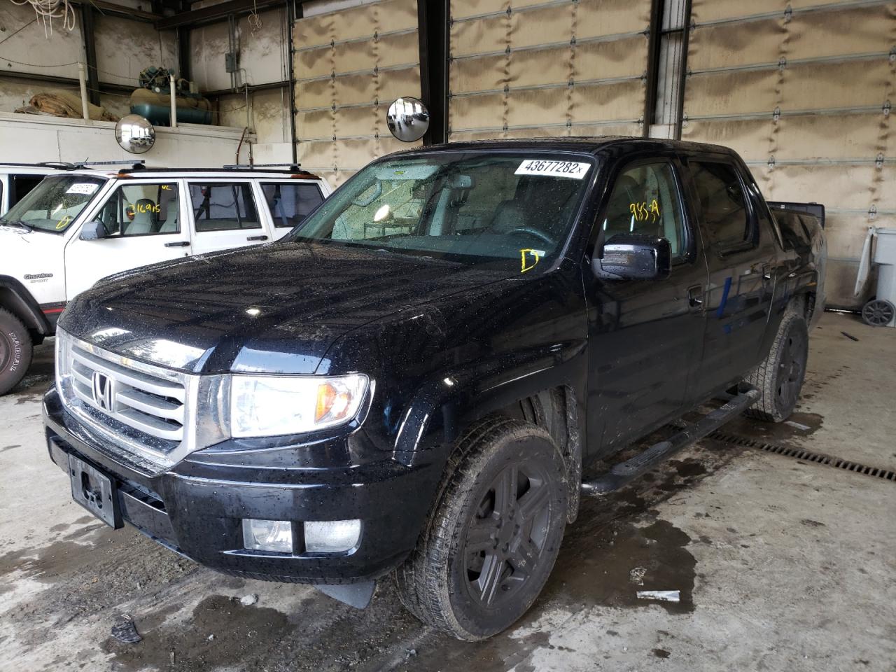Photo 2 from auction – 2013 HONDA RIDGELINE with VIN 5FPYK1F51DB012842