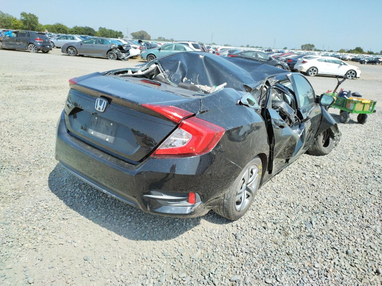 Photo 4 from auction – 2016 HONDA CIVIC LX with VIN 19XFC2F59GE232663