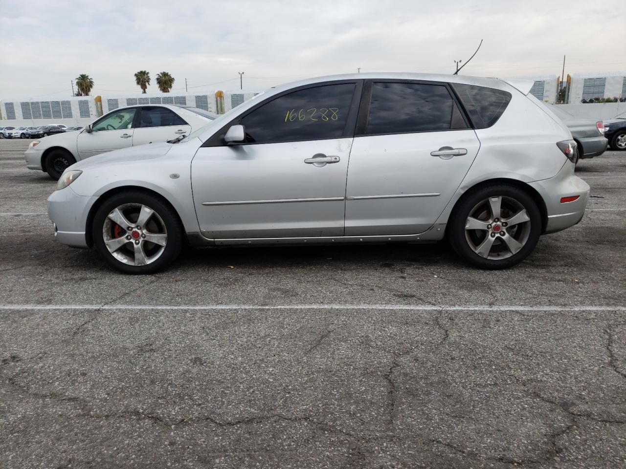Photo 9 from auction – 2004 MAZDA 3 HATCHBAC with VIN JM1BK143X41137766