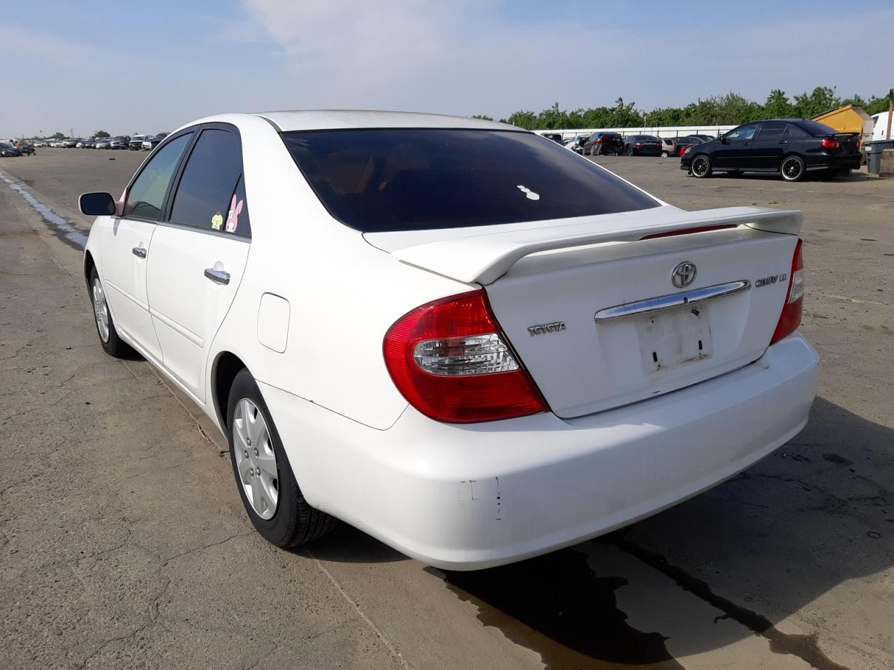 Photo 3 from auction – 2002 TOYOTA CAMRY LE with VIN JTDBE32K520070574