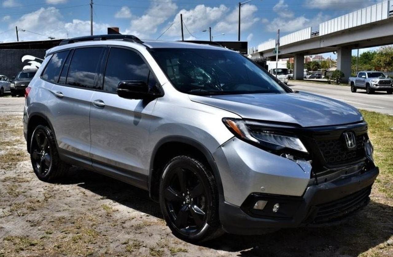 HONDA PASSPORT E 2019 with VIN 5FNYF8H01KB010190 - Photo from auction