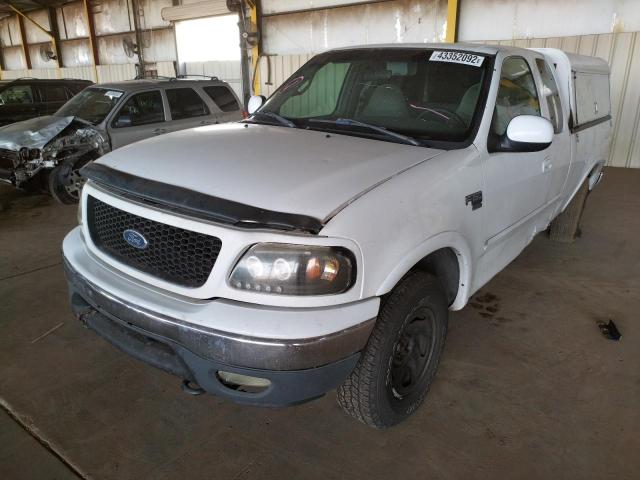 Photo 2 from auction – 2000 FORD F150 with VIN 1FTRX18WXYNB88459