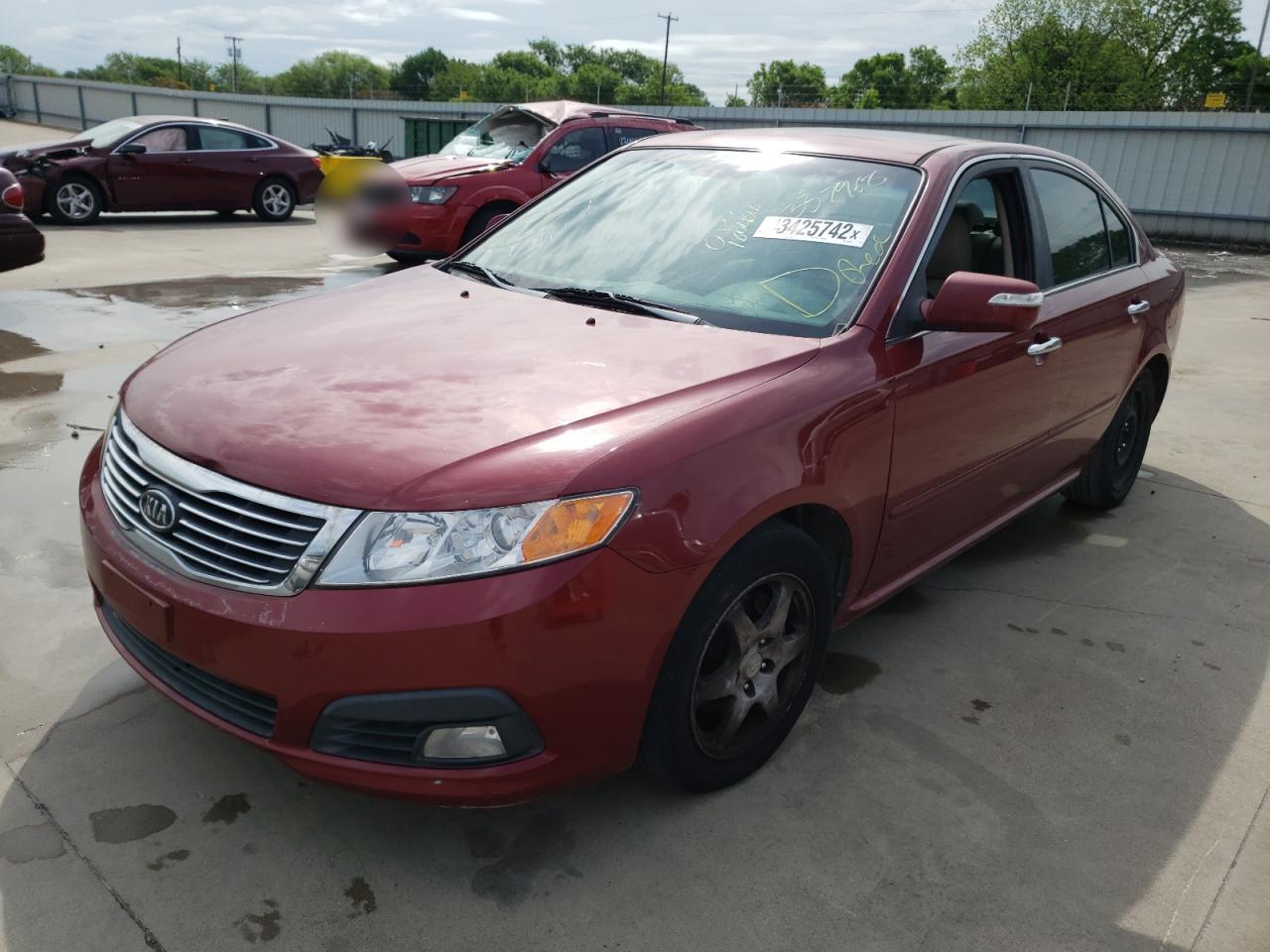 Photo 2 from auction – 2009 KIA OPTIMA LX with VIN KNAGE224995337968