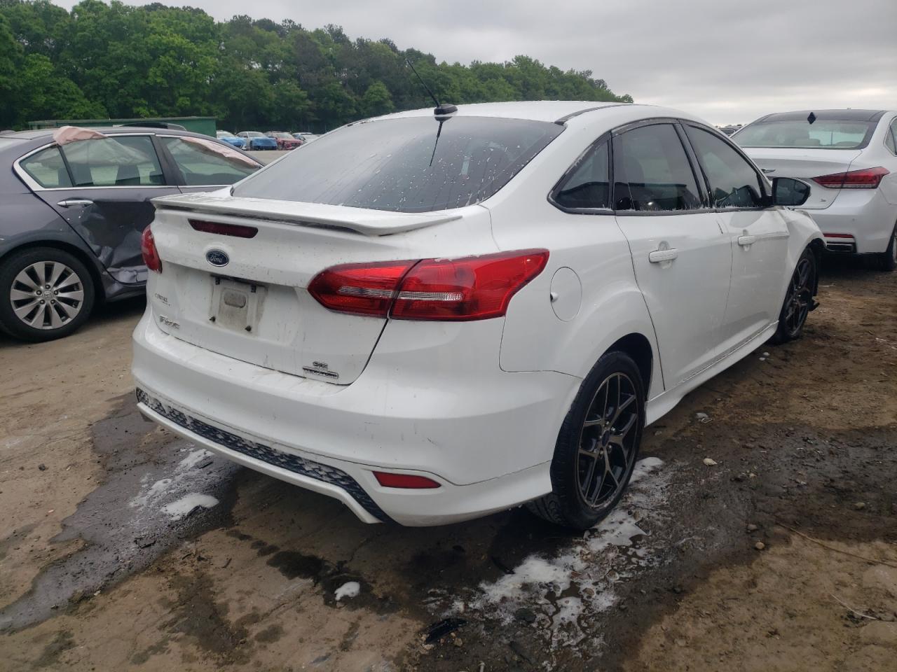 Photo 4 from auction – 2015 FORD FOCUS SE with VIN 1FADP3F20FL338521