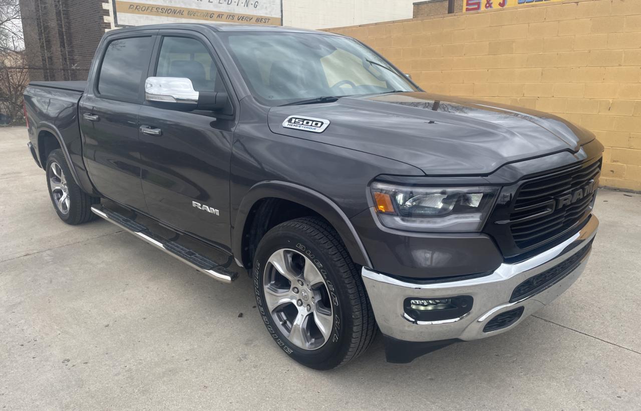 RAM 1500 LARAM 2021 with VIN 1C6SRFJTXMN681035 - Photo from auction