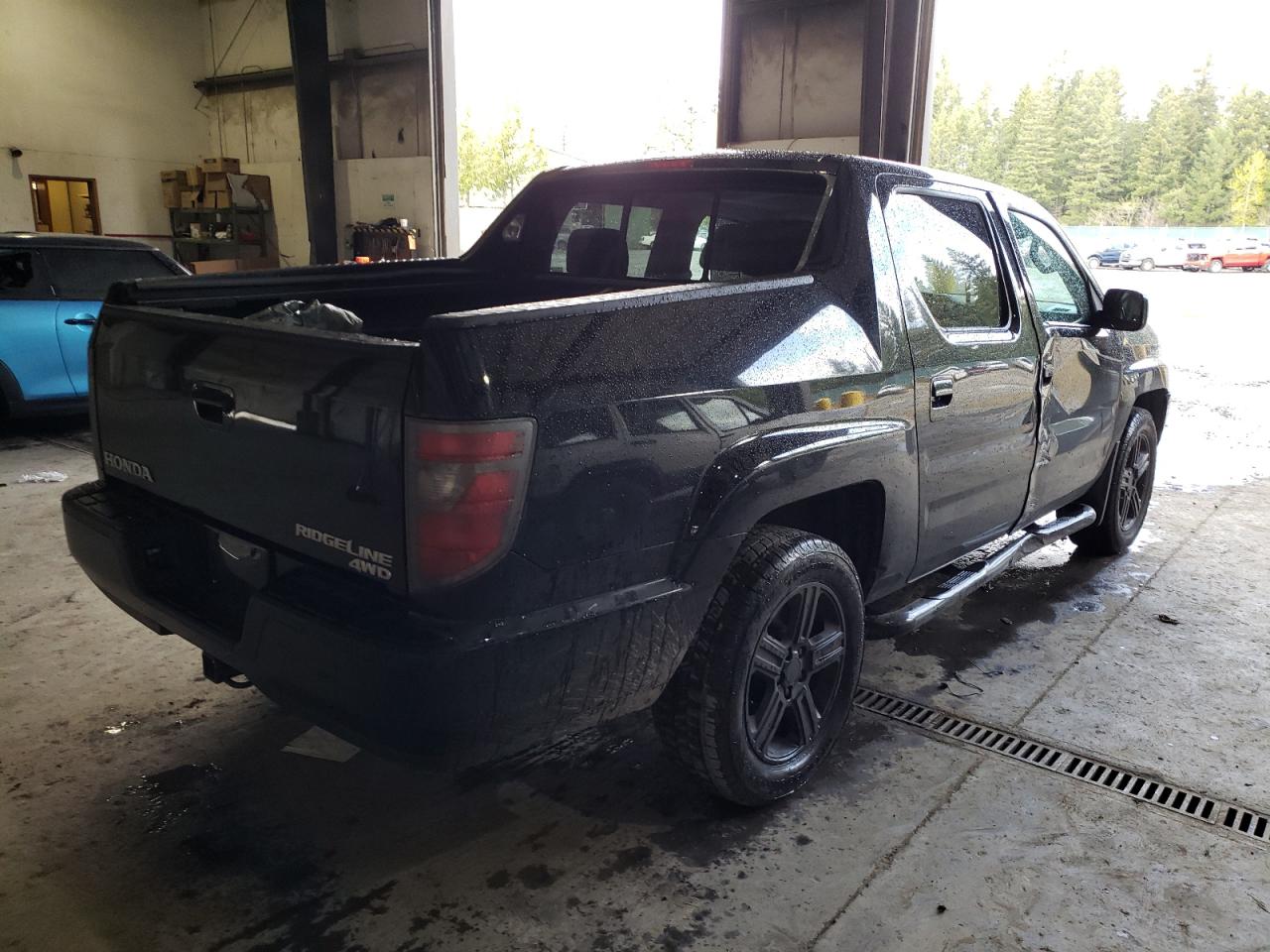 Photo 4 from auction – 2013 HONDA RIDGELINE with VIN 5FPYK1F51DB012842