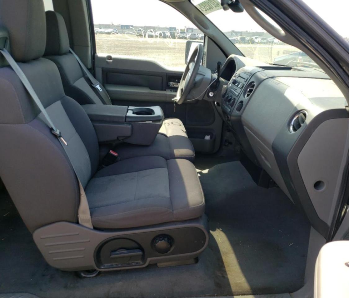 Photo 5 from auction – 2004 FORD F150 with VIN 1FTPX14514NA01589