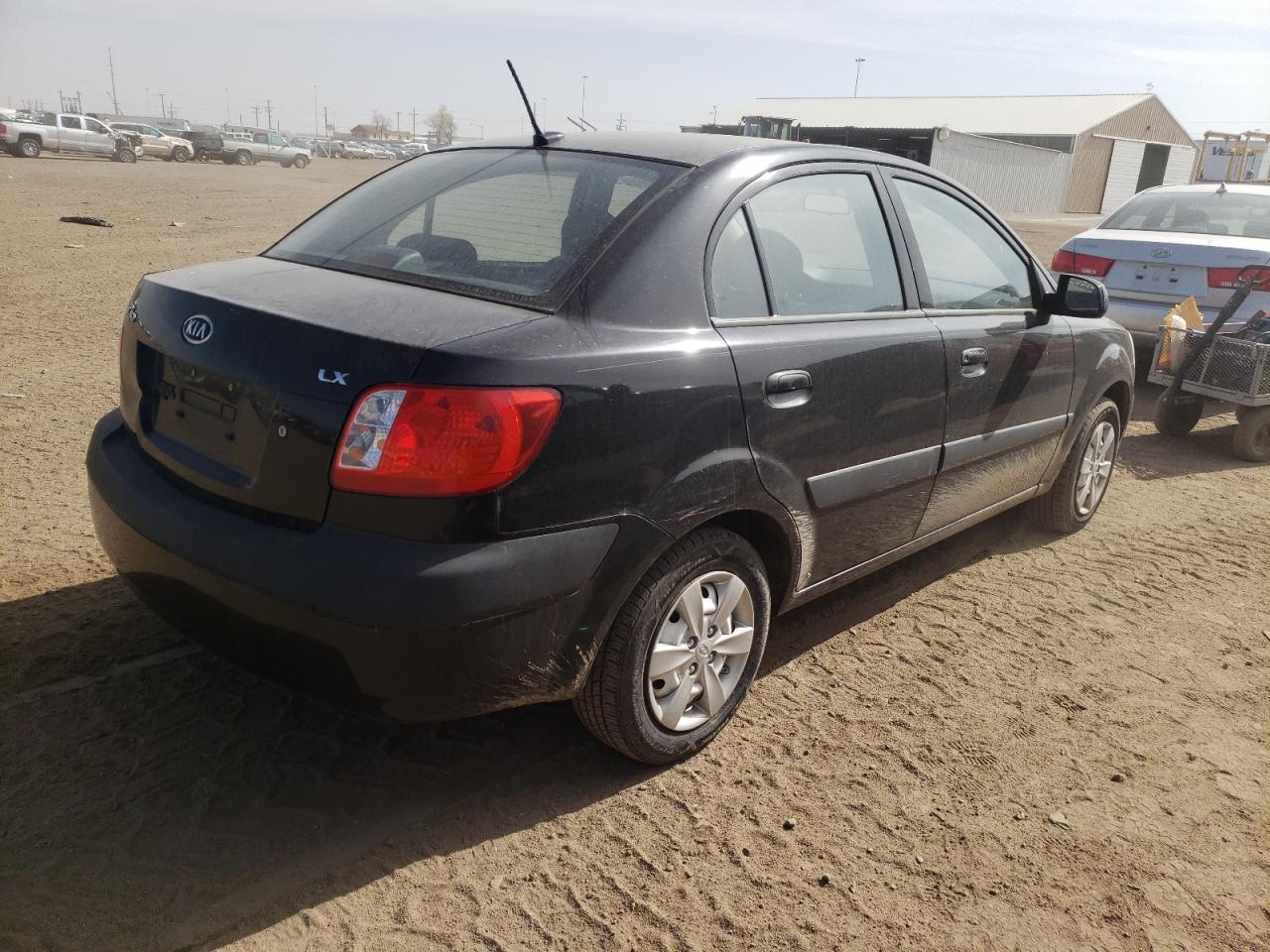 Photo 4 from auction – 2009 KIA RIO BASE with VIN KNADE223396467149