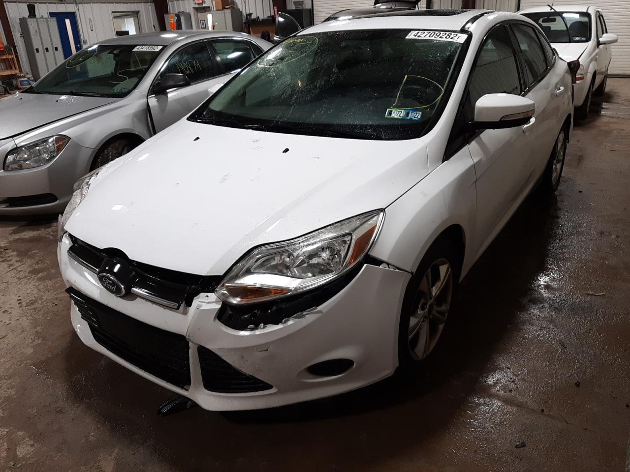 Photo 2 from auction – 2014 FORD FOCUS SE with VIN 1FADP3F2XEL170921