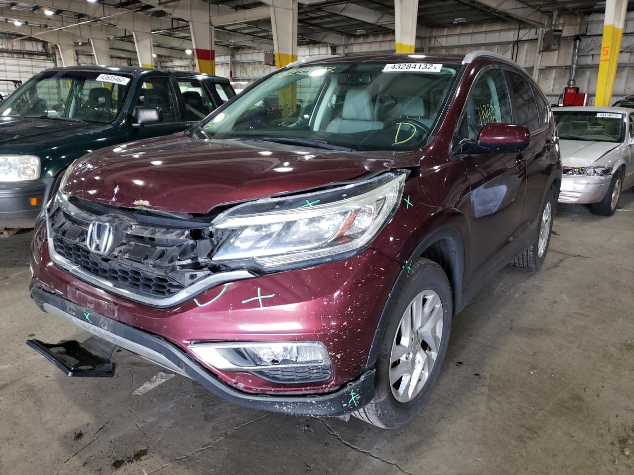 Photo 14 from auction – 2015 HONDA CR-V EXL with VIN 2HKRM4H76FH652458