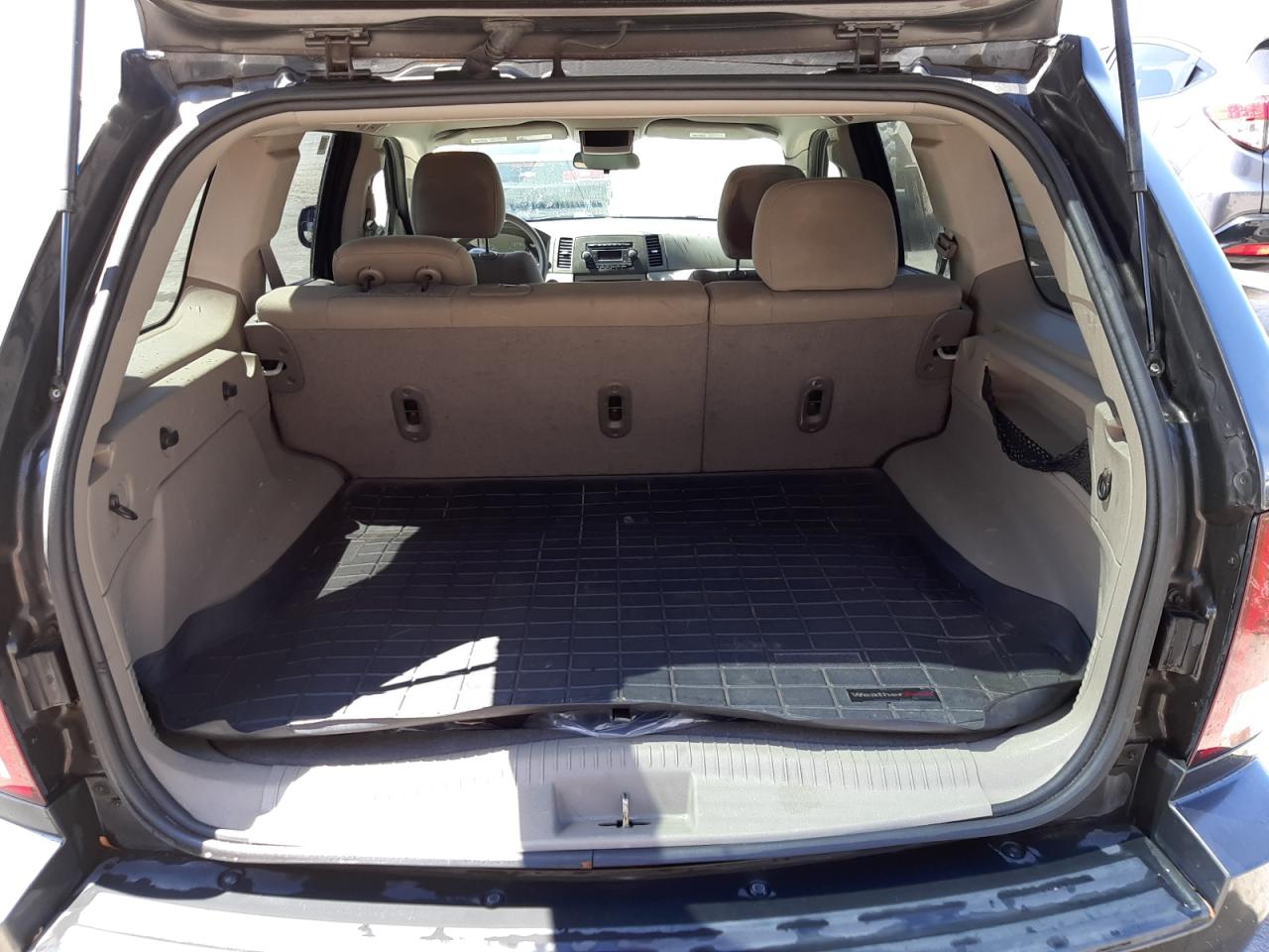 Photo 9 from auction – 2005 JEEP GRAND CHER with VIN 1J4GS48K05C720825