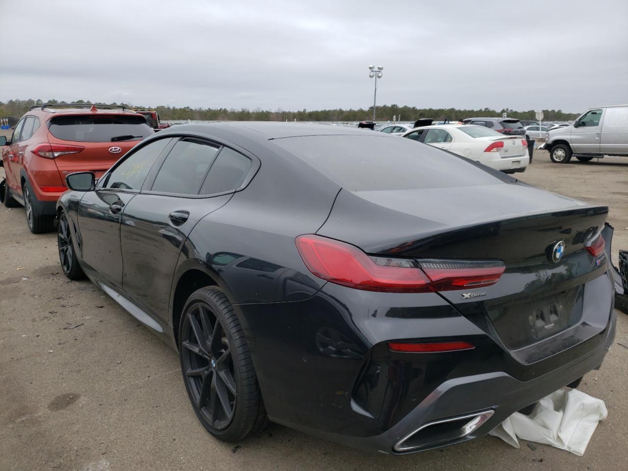 Photo 3 from auction – 2021 BMW M850XI with VIN WBAGV8C09MCE95118